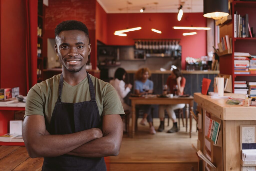 portrait of young restaurant owner manager in a coffee shop 1024x682 - Home Staging