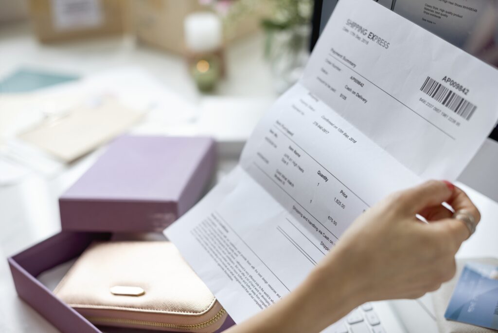 Woman holding bill payment