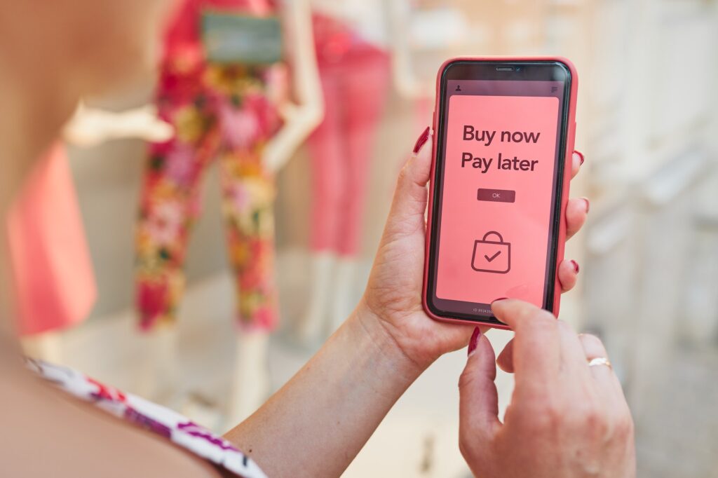 BNPL Buy now pay later online shopping service on smartphone. Paying after delivery. Afterpay. Loan